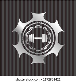 dumbbell icon inside silver emblem