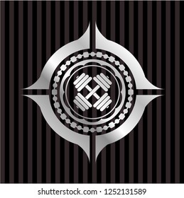 dumbbell icon inside silver emblem or badge