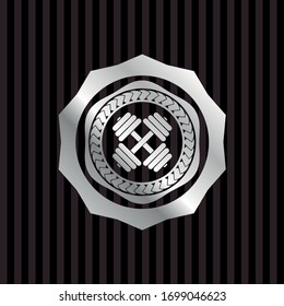 dumbbell icon inside silver emblem
