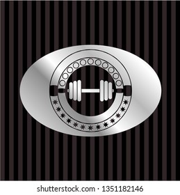 dumbbell icon inside silver shiny badge