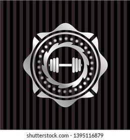 dumbbell icon inside silvery badge or emblem