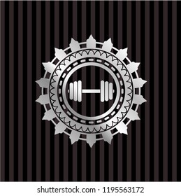 dumbbell icon inside silvery emblem or badge