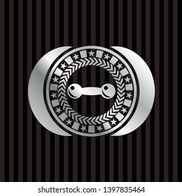 dumbbell icon inside silvery emblem or badge