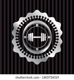 dumbbell icon inside silvery emblem