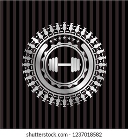dumbbell icon inside silvery shiny emblem