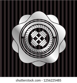 dumbbell icon inside silvery shiny badge