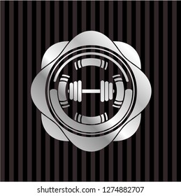 dumbbell icon inside silvery shiny badge