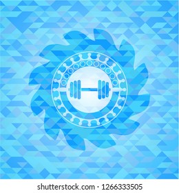 dumbbell icon inside sky blue mosaic emblem