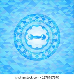 dumbbell icon inside sky blue emblem with triangle mosaic background