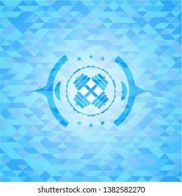dumbbell icon inside sky blue emblem with mosaic ecological style background