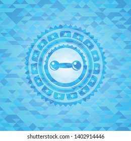 dumbbell icon inside sky blue emblem. Mosaic background