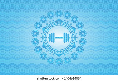 dumbbell icon inside water concept emblem background.