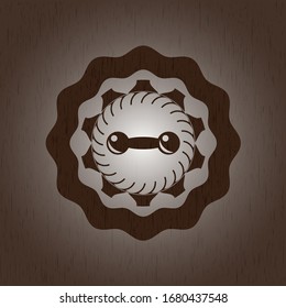 ícono de timbre dentro del emblema de madera. Vintage.