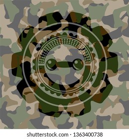 dumbbell icon on camo pattern