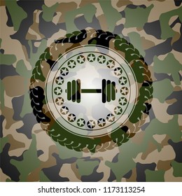 dumbbell icon on camouflaged pattern