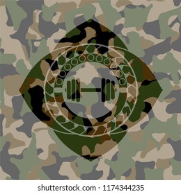 dumbbell icon on camouflaged pattern
