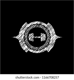dumbbell icon on chalkboard