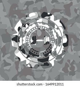 dumbbell icon on grey camo pattern