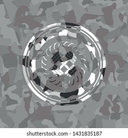 dumbbell icon on grey camouflaged texture