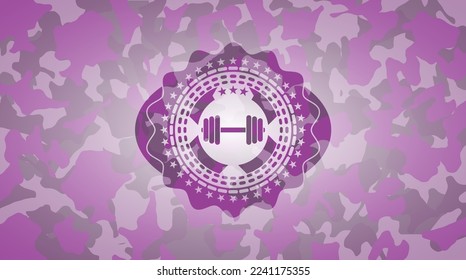 dumbbell icon on pink camo texture. 