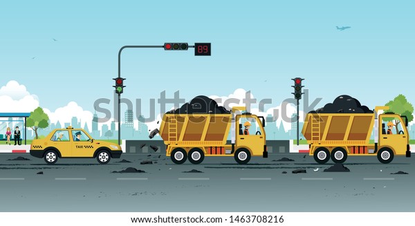 Dump truck\
drivers make dirt roads with\
soil.