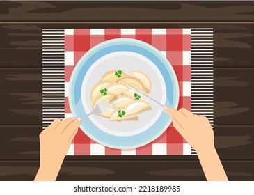 Dumping in a plate on a wooden table top view.
