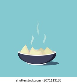 The dumplings are on the plate. Steam comes from the dumplings. The plate casts a shadow. 