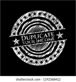 Duplicate your Income chalkboard emblem written on a blackboard