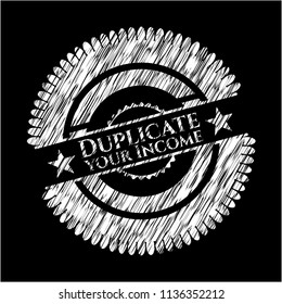 Duplicate your Income written on a blackboard