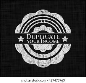 Duplicate your Income written on a blackboard