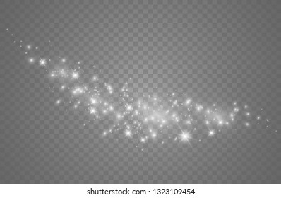 The dust sparks and golden stars shine with special light. Vector sparkles on a transparent background. Christmas light effect. Sparkling magical dust particles.