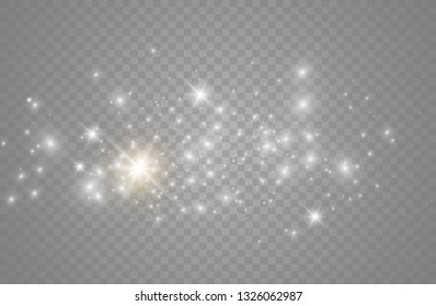 The dust sparks and golden stars shine with special light. Vector sparkles on a transparent background. Christmas light effect. Sparkling magical dust particles.