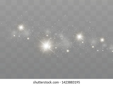 The dust sparks and golden stars shine with special light. Vector sparkles on a transparent background. Christmas light effect. Sparkling magical dust particles.
