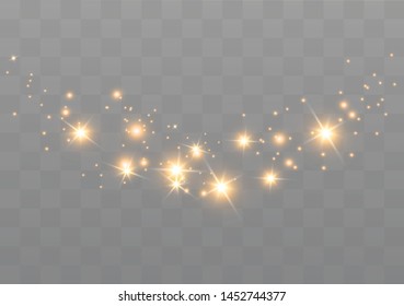 The dust sparks and golden stars shine with special light. Vector sparkles on a transparent background. Christmas light effect. Sparkling magical dust particles.