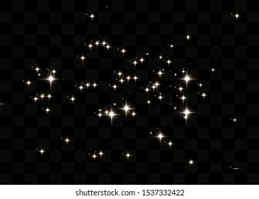 The dust sparks and golden stars shine with special light. Vector sparkles on a transparent background. Christmas light effect. Sparkling magical dust particles.