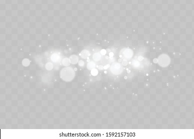 The dust sparks and golden stars shine with special light. Vector sparkles on a transparent background. Christmas light effect. Sparkling magical dust particles