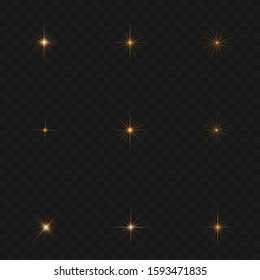 The dust sparks and golden stars shine with special light. Vector sparkles on a transparent background. Christmas light effect. Sparkling magical dust particles.