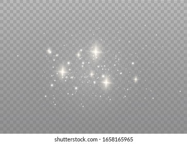 The dust sparks and golden stars shine with special light. Vector sparkles on a transparent background. Christmas light effect. Sparkling magical dust particles.