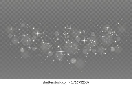 The dust sparks and golden stars shine with special light. Vector sparkles on a transparent background. Christmas light effect. Sparkling magical dust particles.