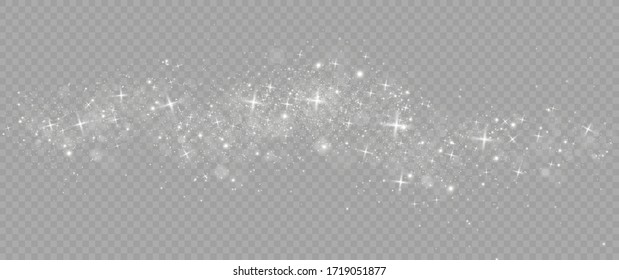 The dust sparks and golden stars shine with special light. Vector sparkles on a transparent background. Christmas light effect. Sparkling magical dust particles.