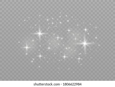 The dust sparks and golden stars shine with special light. Vector sparkles on a transparent background. Christmas light effect. Sparkling magical dust particles.