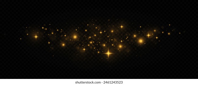 The dust sparks and golden stars shine with special light on a transparent background. Christmas concept. Golden shimmering background with light effect.