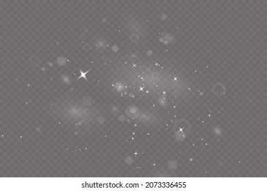 Dust sparks and stars shine with a special light. Christmas light effect. Glittering particles of magic dust.Vector sparkles on a transparent background.