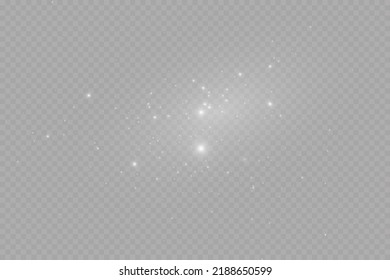 Dust sparks and stars shine with a special light. Christmas light effect. Glittering particles of magic dust.Vector sparkles on a transparent background.