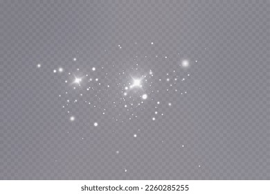 Dust sparks and stars shine with a special light. Christmas light effect. Glittering particles of magic dust.Vector sparkles on a transparent background.