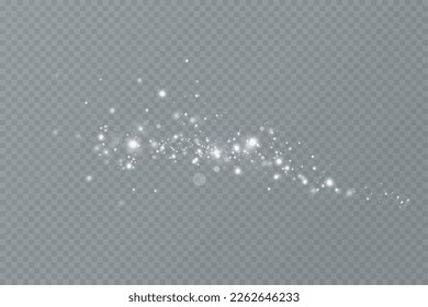 Dust sparks and stars shine with a special light. Christmas light effect. Glittering particles of magic dust.Vector sparkles on a transparent background.