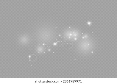 Dust sparks and stars shine with a special light. Christmas light effect. Glittering particles of magic dust.Vector sparkles on a transparent background.