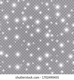 The dust sparks and white stars shine with special light. Vector sparkles on a transparent background. Christmas light effect. Sparkling magical dust particles.