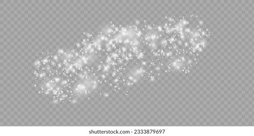 The dust sparks and white stars shine with special light. Vector sparkles on a transparent background. Christmas light effect. Sparkling magical dust particles