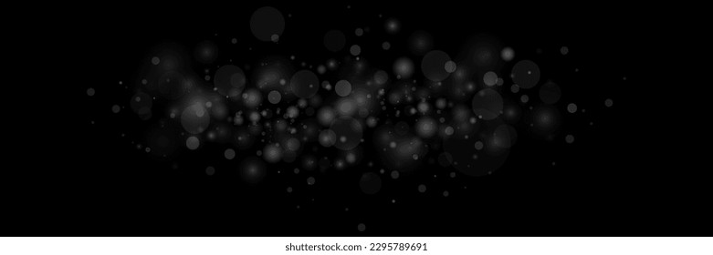 The dust is white. White sparks and stars shine with a special light. Vector sparkles on a black background. Christmas light effect. Shiny magical dust particles.